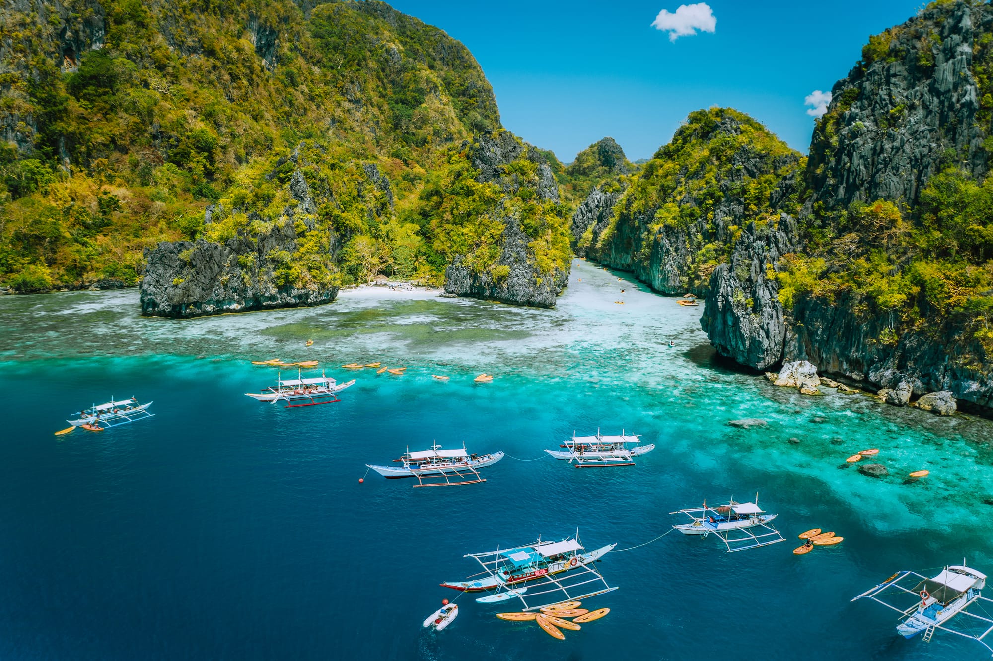 aerial-view-of-tourist-boats-in-front-of-big-lagoo-2024-10-18-07-16-26-utc.jpg