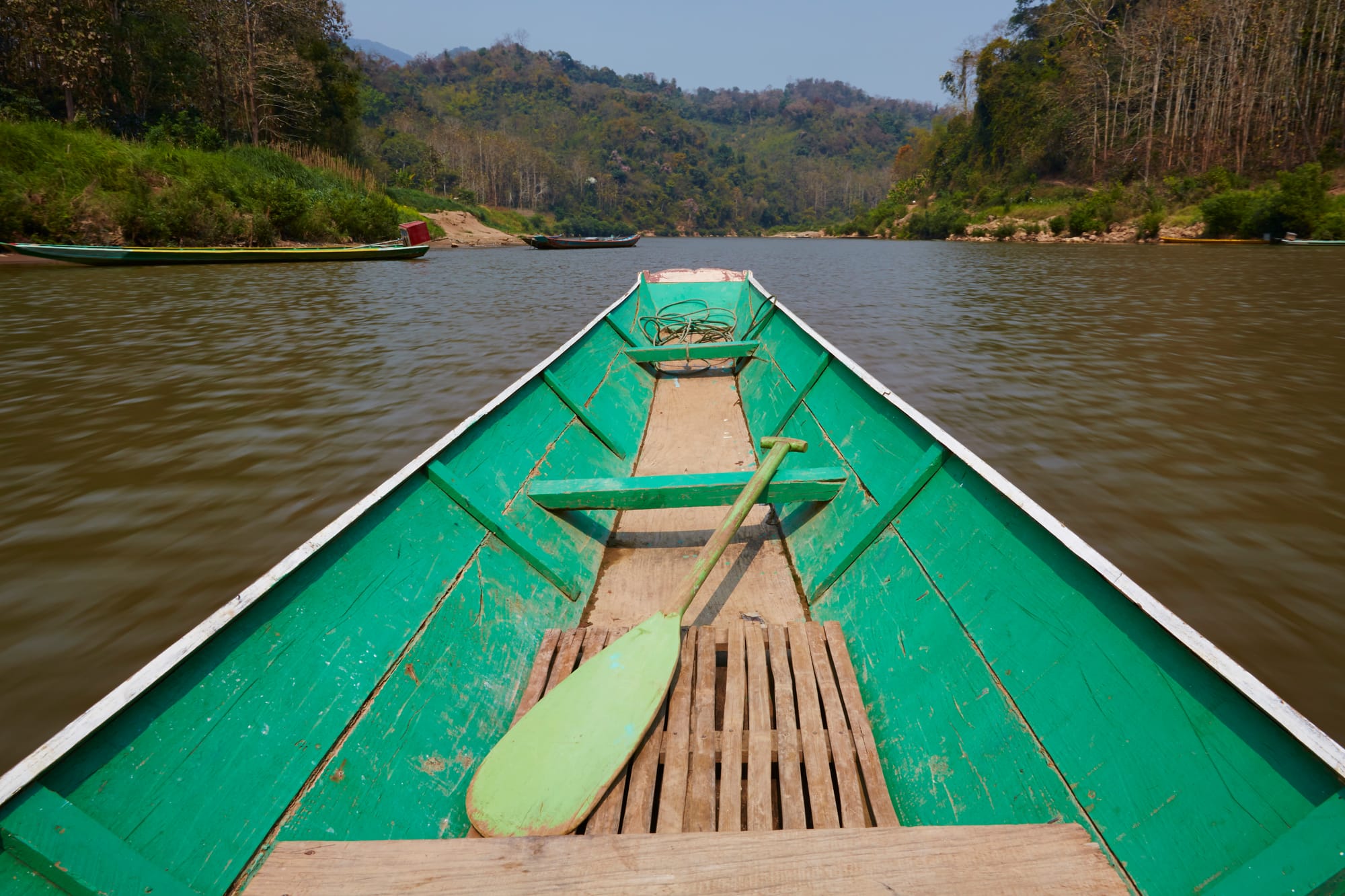 green-rowing-boat-on-river-luang-prabang-laos-2025-04-04-17-34-11-utc.jpg